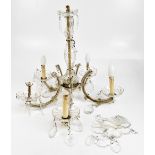 A cut glass five branch chandelier with applied floral motifs and suspending drops, length