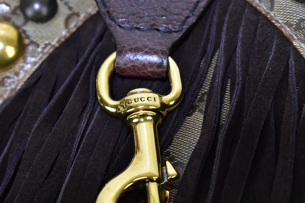 GUCCI; a large monogram cloth handbag with brown suede and leather hand and shoulder straps, - Image 4 of 9