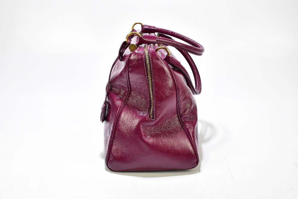 YVES SAINT LAURENT; a large claret coloured 'Muse' gloss patent leather messenger handbag with - Image 2 of 6