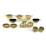 Eleven hallmarked silver open salts including a pair of twin handled examples with gadrooned