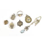 A small mixed group of jewellery including two hallmarked silver watch fobs/medals, three lockets, a