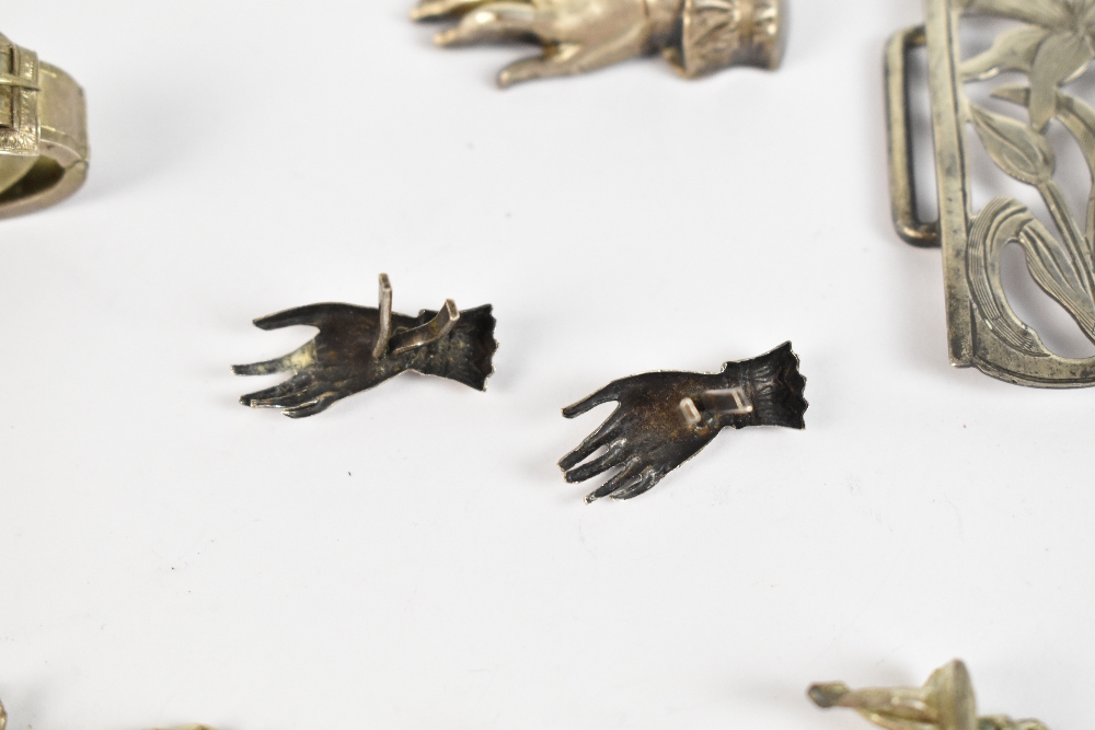 Three late 19th/early 20th century silver brooches/pins modelled as hands, a scarf clip modelled - Image 3 of 5