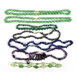 A small group of bead necklaces including a malachite and haematite example.