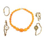 A set of amber coloured beads with yellow metal clasp, together with four gold plated lady's