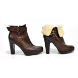 MIU MIU; a pair of soft brown leather heeled boots with a sheepskin lining and buckle and a zip-up