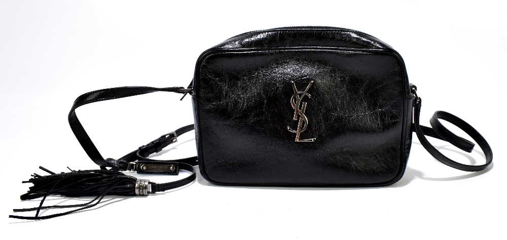 YVES SAINT LAURENT; a black leather shoulder bag with silver tone 'YSL' logo to front, a zip top,
