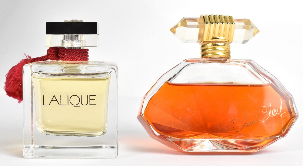 LALIQUE; a modern clear glass perfume bottle with contents 'Eau de Parfum', 100ml, fitted in