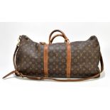 LOUIS VUITTON; a circa 1990s monogram Keepall Bandoliere 60, model no. m.41412, serial no.871,