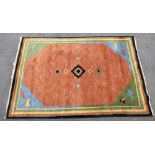 A large Middle Eastern rug with stylised wildlife to corners, approx 270 x 187cm.Additional