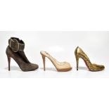 LOUBOUTIN; a pair of decollete ostrich Cosmo gold stiletto court shoes, heel 11cm, size 40, with