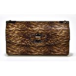 SALVATORE FERRAGAMO; a calfskin leather animal print shoulder bag, with iconic silver tone fastening