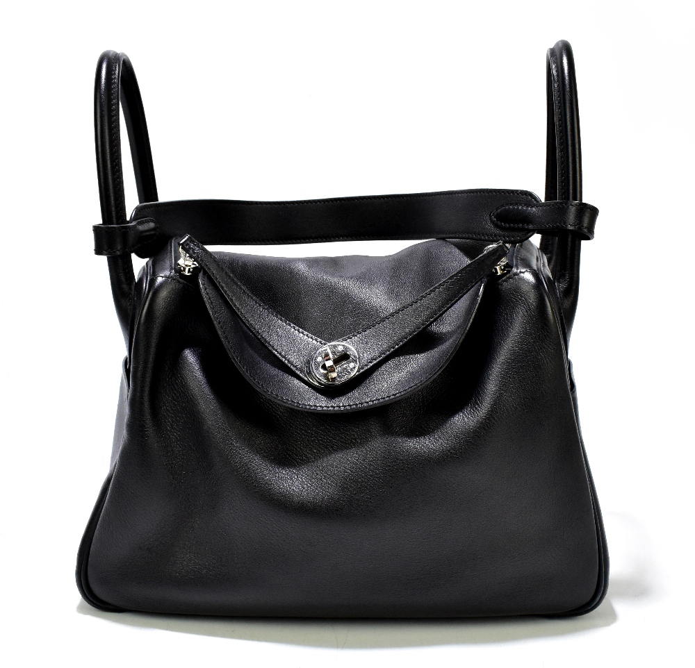HERMÈS; a circa 2007 black Taurillon leather 'Lindy 30', with palladium hardware and white