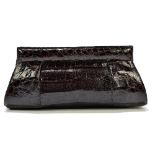 NANCY GONZALEZ; a brown crocodile leather clutch bag, with magnetic closure, tan suede interior