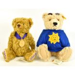 STEIFF; two modern teddy bears, including a growler, each fitted in canvas bags.Additional