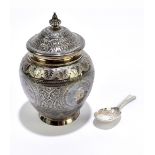 EDWARD, JOHN & WILLIAM BARNARD; a Victorian hallmarked silver tea caddy and spoon, with cast