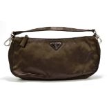 PRADA; a brown satin shoulder bag/clutch with silver tone hardware, a zip top and detachable strap