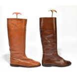 GUCCI; a pair of flat brown leather riding boots with Gucci logo embossed to side, size 39 1/2,