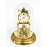 A gilt metal anniversary clock, the circular dial set with Arabic numerals, the back plate no.