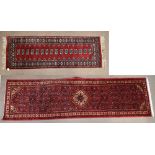 A Persian red ground runner, 291 x 84cm, with partial label to reverse, and a smaller example, 187 x