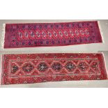 A Bokhara-type red ground runner, 273 x 69cm, and a further red ground runner with geometric