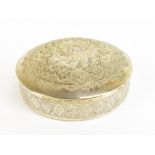 A late 19th/early 20th century Persian lidded circular trinket box with relief and engraved stylised