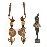 A pair of modern cast metal wall lights, representing Blackamoor type figures, height 72cm, and a