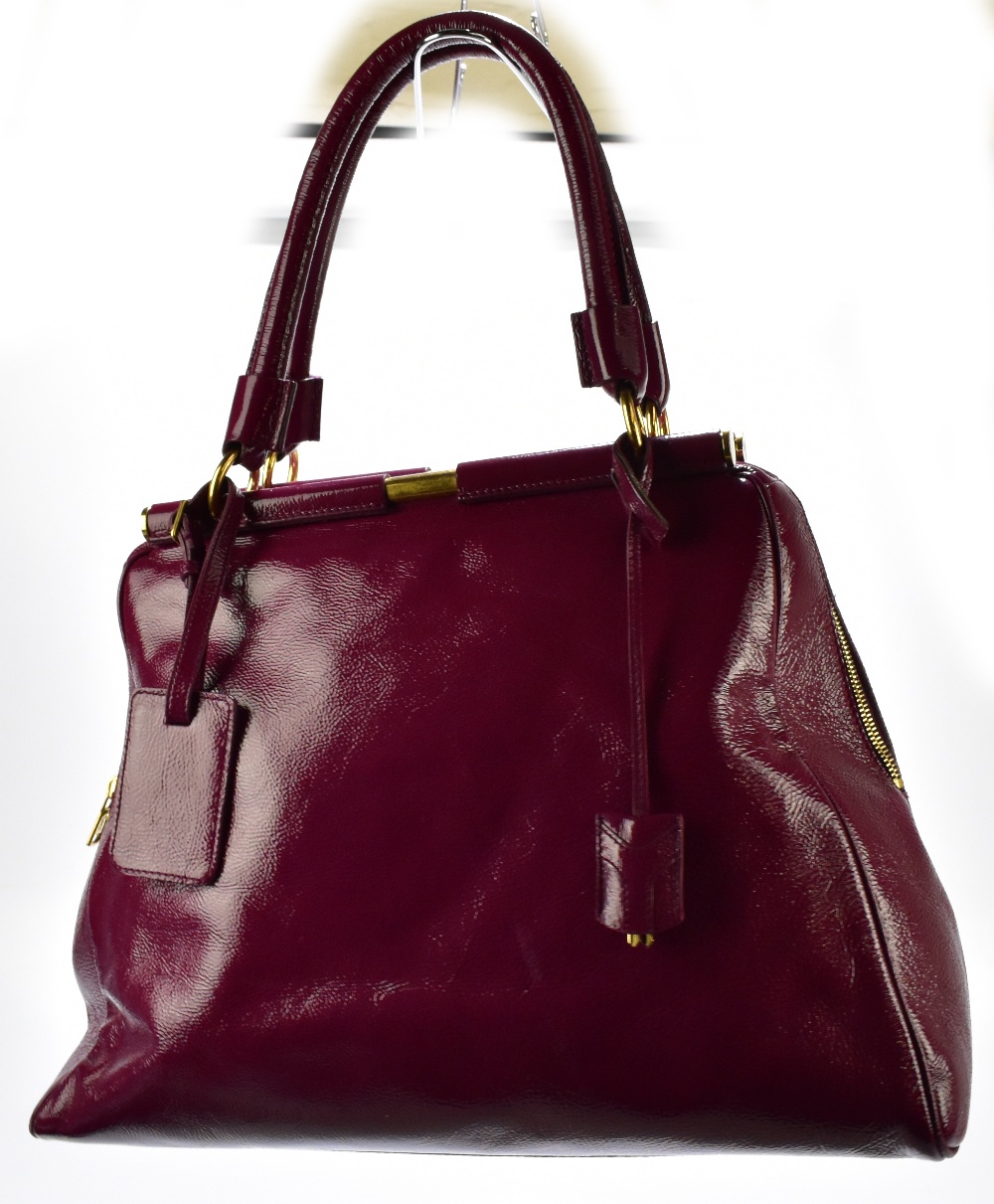 YVES SAINT LAURENT; a large claret coloured 'Muse' gloss patent leather messenger handbag with - Image 5 of 6