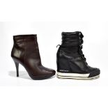 DKNY; a pair of black leather wedged trainers with glitter detail, zip-off top and lace front with