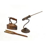 An 18th century goffering iron, length 44cm, a pair of curling irons and an iron stamped to