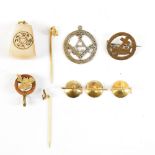 A group of Masonic yellow and gilt metal stick pins, badges and buttons including an enamelled