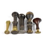 Five wax hand seals, one impressed with family crest, four examples with treen handles, length of