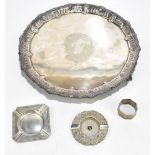 LANSON LTD; an Elizabeth II hallmarked silver ashtray with cast Celtic knot-style decoration to