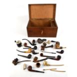 A collection of assorted pipes to include meerschaum type examples, a clay example stamped P.