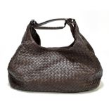 BOTTEGA VENETA; a soft brown nappa intrecciato leather 'City Veneta' bag with shoulder straps and