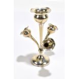 A hallmarked silver four branch posy holder, Chester 1901, height 20cm (weighted).Additional