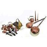 A collection of 19th century and later metalware, including copper kettles, animal traps, Eccles