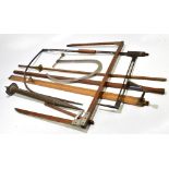 A collection of wooden and metal cask gauges and instruments, various makers to include Dring & Fage