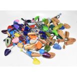 Eight pairs of wooden shoe trees and thirty pairs of colourful plastic shoe trees.