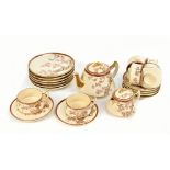 A Japanese Satsuma twenty piece tea service, each decorated with stylised birds and foliate, with
