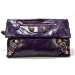 BALENCIAGA; a purple leather City envelope clutch/shoulder bag with detachable cross body strap
