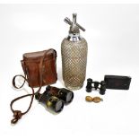 A small group of collectors' items comprising a soda siphon, a Kodak A127 camera, a pair of opera