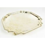 MAPPIN & WEBB; a George V hallmarked silver salver of square form, with cast scalloped edge,