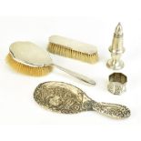 WILLIAMS LTD; an Edward VII hallmarked silver dressing table hand mirror with repoussé floral