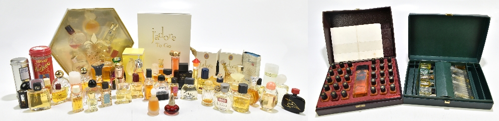 A quantity of miniature used and unused perfumes including Gucci, Armani, Balenciaga, Van Cleef