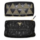 PRADA; a black soft leather purse/makeup bag with gold tone zipper to top and Prada logo, 19 x 11