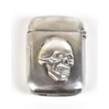 ADOLF FRANKAU & CO; a Victorian hallmarked silver vesta case with applied skull decoration,