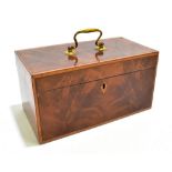 A Georgian flame mahogany tea caddy with brass swan neck handle to the cover enclosing three