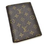 LOUIS VUITTON; a large vintage monogram leather canvas wallet/card holder with sections for ID