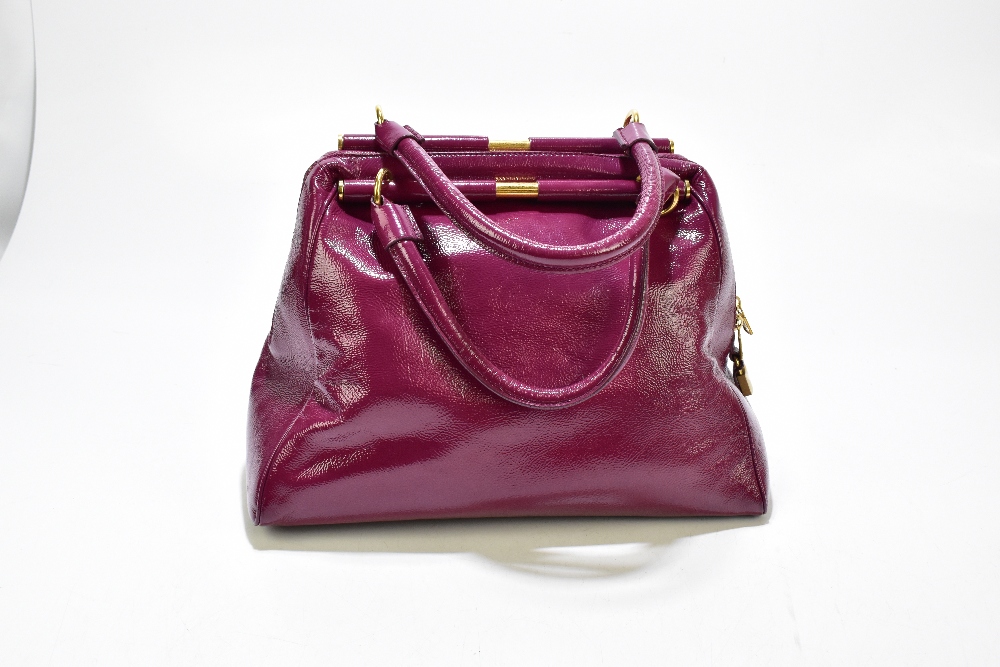 YVES SAINT LAURENT; a large claret coloured 'Muse' gloss patent leather messenger handbag with - Image 3 of 6