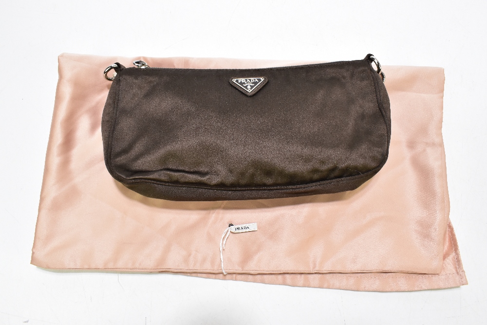 PRADA; a brown satin shoulder bag/clutch with silver tone hardware, a zip top and detachable strap - Image 7 of 7